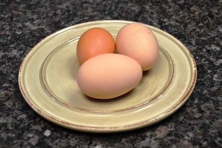 what causes double yolks